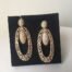 Gold Tear Drop Statement Earrings Three